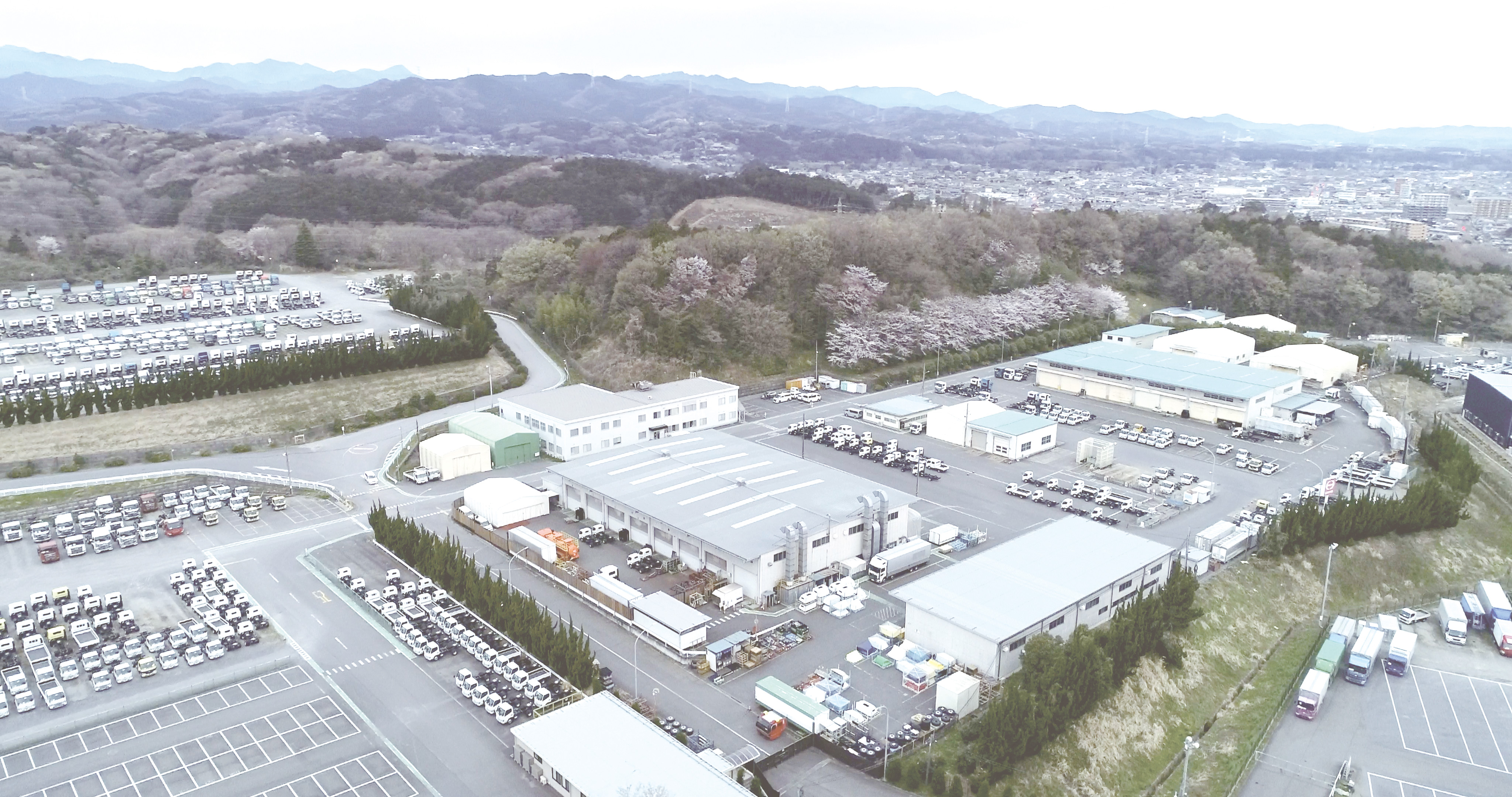 背景写真：敷地の空撮写真